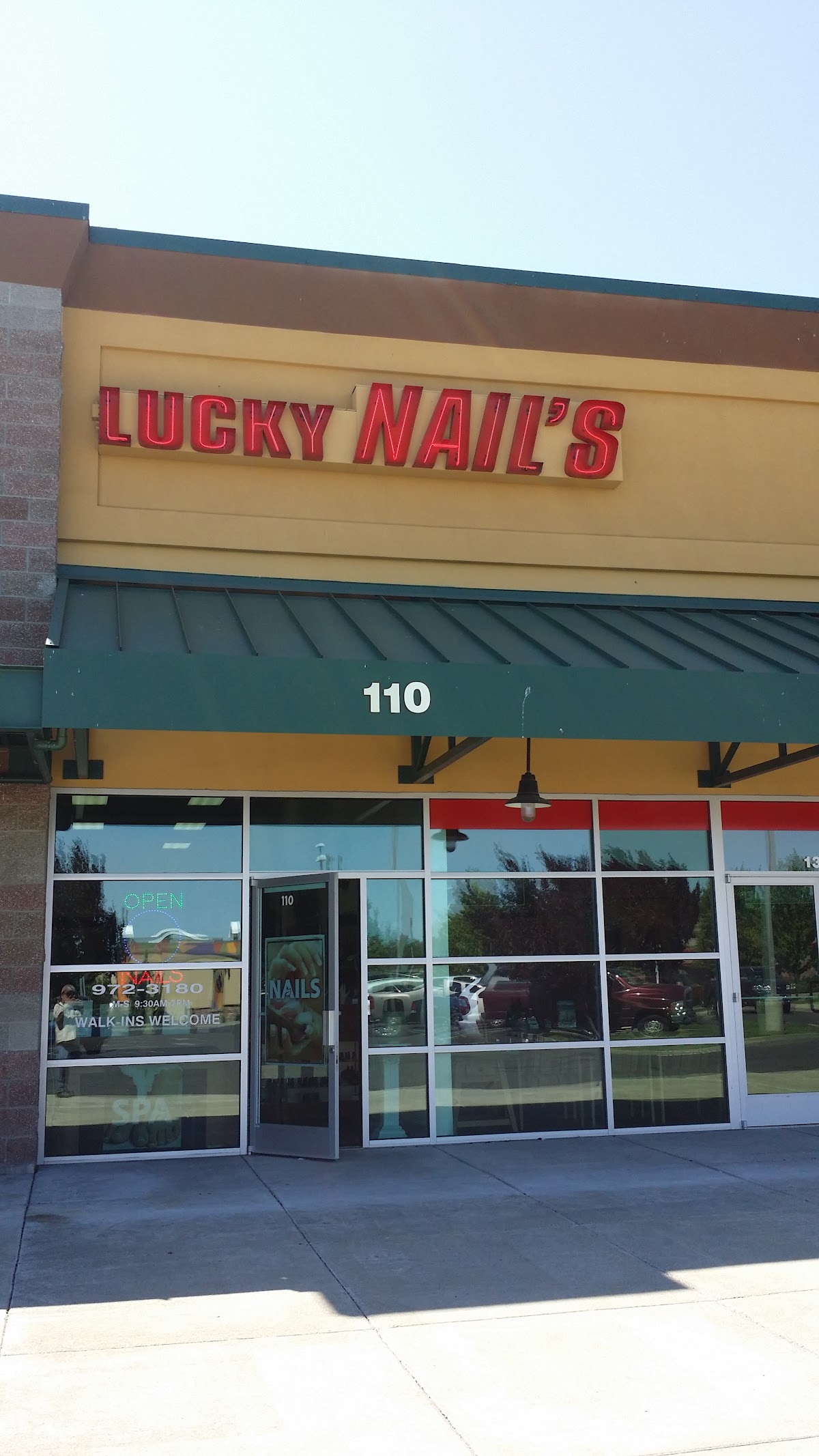 Lucky Nails storefront with red neon sign on 72nd Ave, Yakima